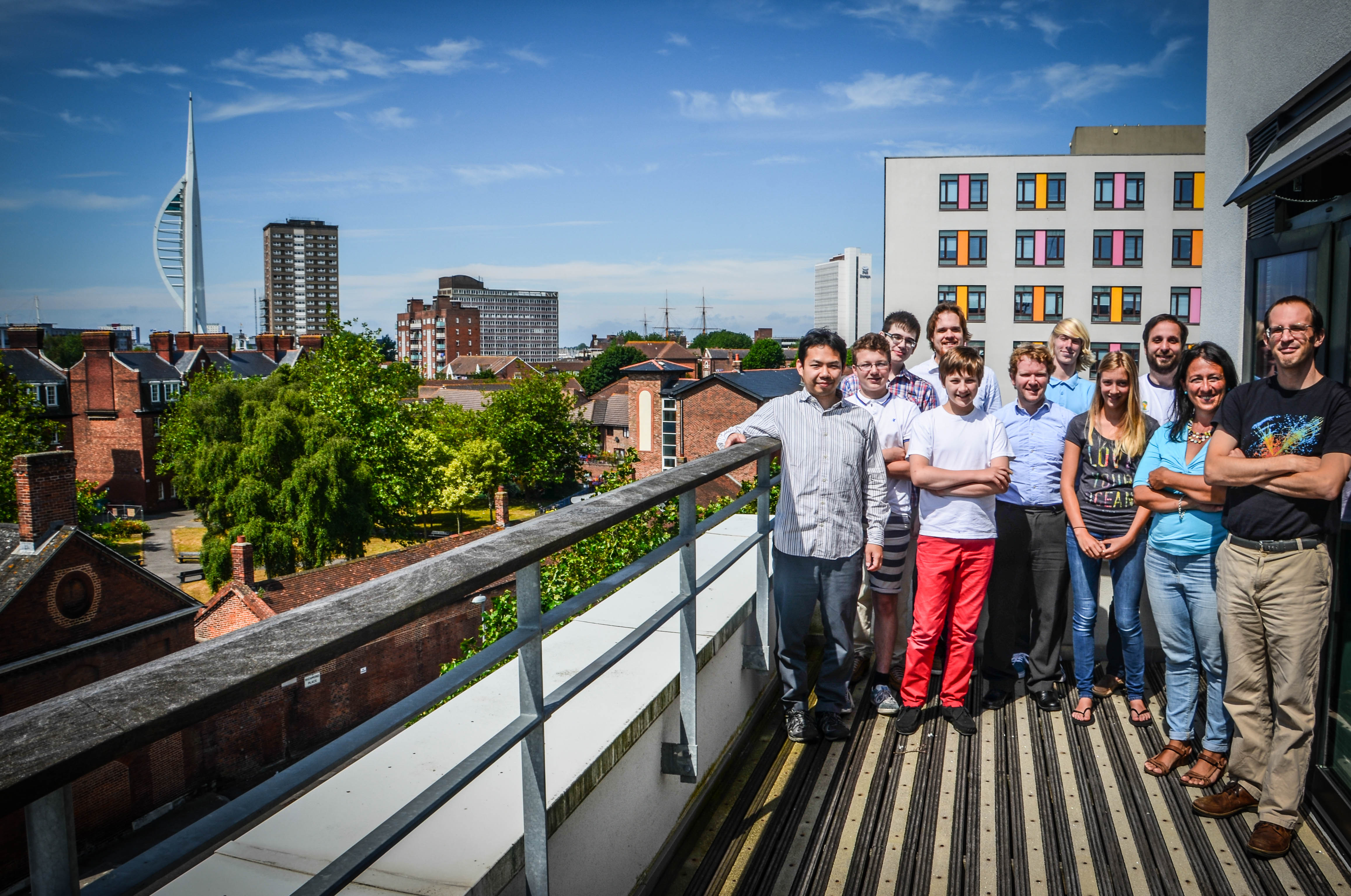 Work experience students in June 2014 with some of their ICG supervisors, on the terrace of our building.