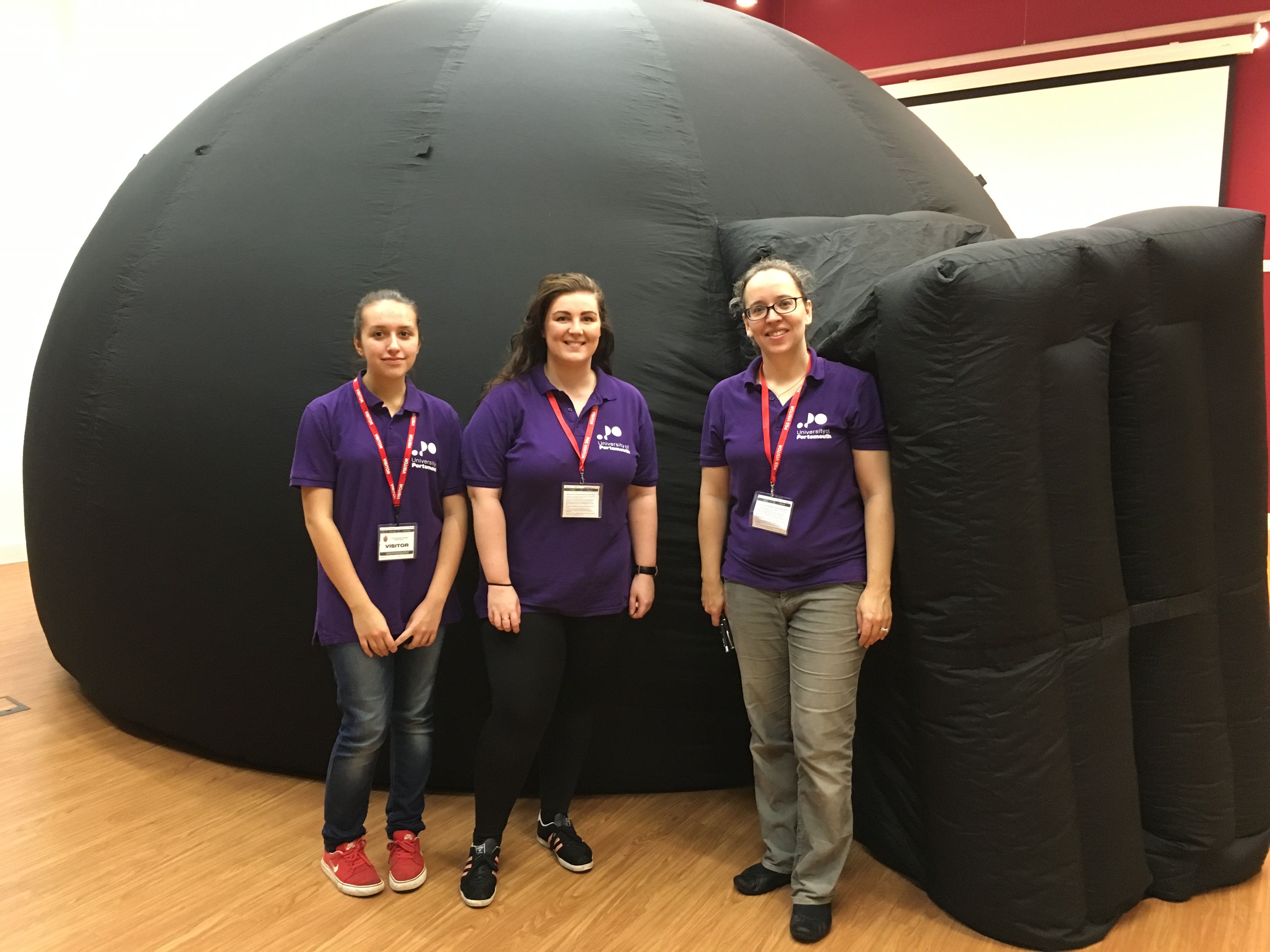 Wiktoria, Charlotte and Karen with the ICG astrodome at the Bright Sparks event.